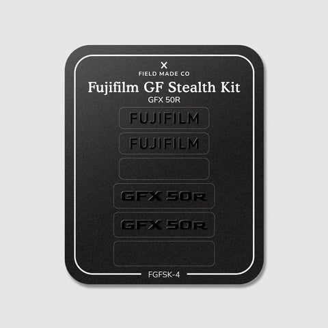 Stealth Kit for Fujifilm GFX 50R: Ghost Logo and Plain Black vinyl labels for the Fujifilm and GFX 50R badges on the Field Made Co backing sheet