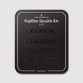 Stealth Kit for Fujifilm X-T5: Ghost Logo and Plain Black vinyl labels on the Field Made Co backing sheet